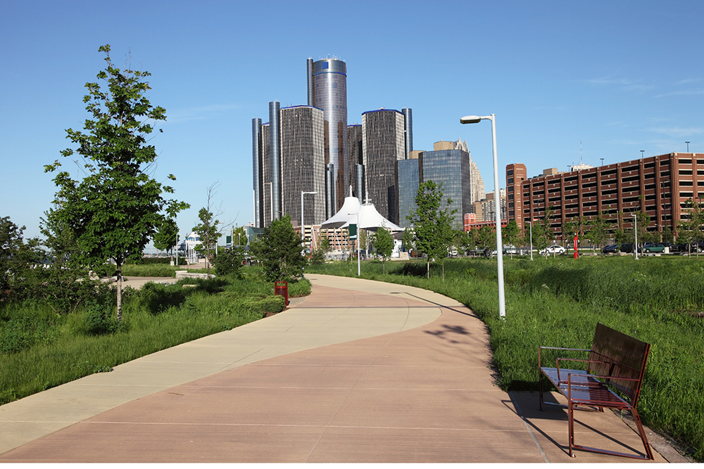 Detroit International RiverWalk spans 5 ½ miles of riverfront, from the Ambassador Bridge to Gabriel Richard Park. Detroit is the largest city in the state of Michigan. Detroit is known as  the birthplace of the automotive industry and an important source of popular music legacies